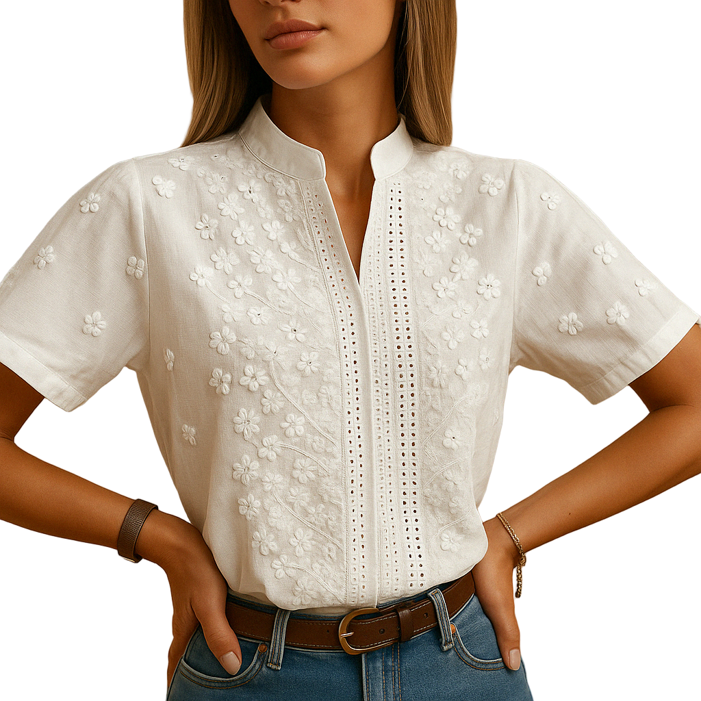 Elegant white blouse for women with a classic collar and button closure, perfect for work or casual occasions.