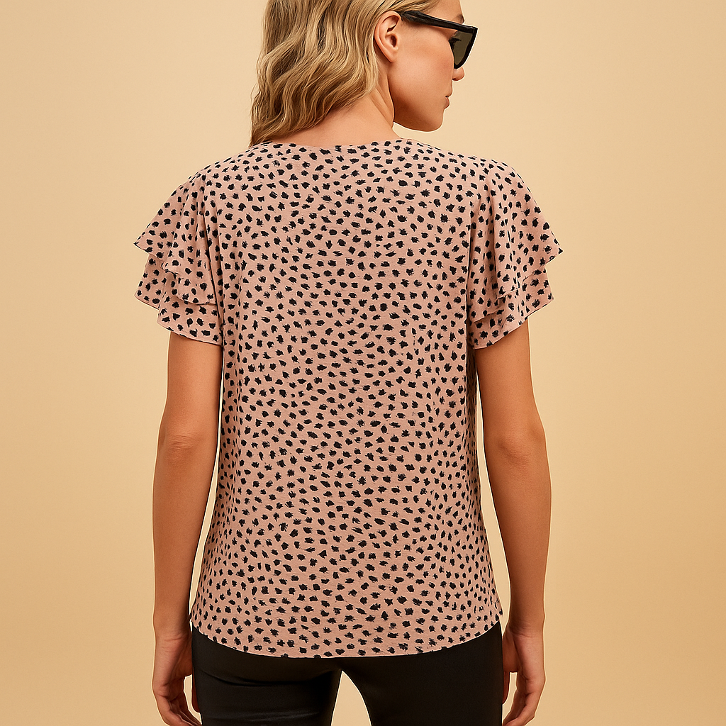 Women’s bold printed flowy top with a flattering fit, perfect for casual outings or elegant occasions across all seasons.