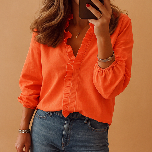 Elegant ruched blouse for women featuring subtle ruffles and a flattering fit, perfect for workdays or chic casual looks.