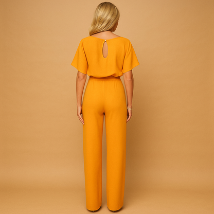 High-waist jumpsuit with lace-up detail for women, featuring a tailored fit and soft draping fabric for casual chic or formal occasions.