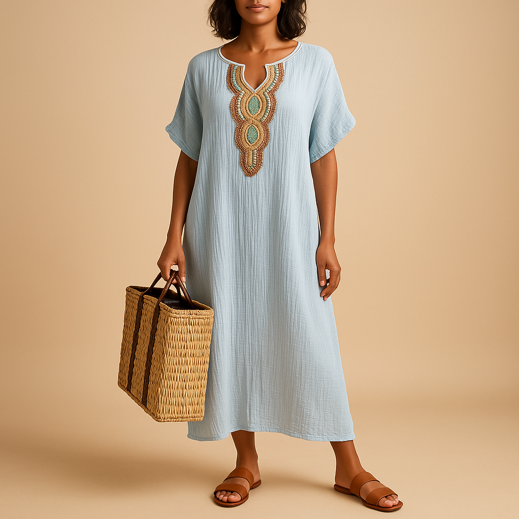 Airy kaftan summer dress for women with a loose flowing silhouette, ideal for beach days, holidays, and warm weather occasions.