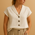 Women’s airy round-neck blouse with button closure, ideal for summer days, vacations, and relaxed casual outfits.