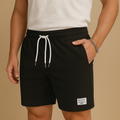 Men’s casual structured summer shorts with elastic waistband and drawstring, perfect for beach days, lounging, and warm weather outfits.