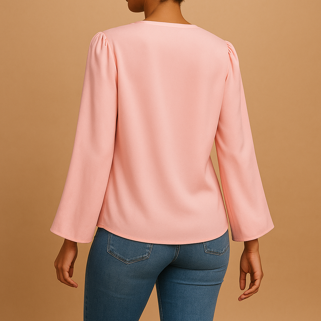 Women’s chiffon blouse with V-neck and puff sleeves in soft colors, ideal for casual outings and refined formal looks.