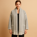 Women’s elegant belted winter coat with warm lining and removable scarf, ideal for winter days, city outings, and formal occasions.