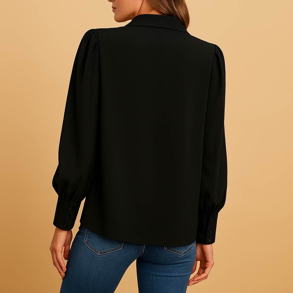 Women’s elegant lantern-sleeve blouse with a shirt collar, buttons, and gathered sleeves, ideal for work and everyday wear.