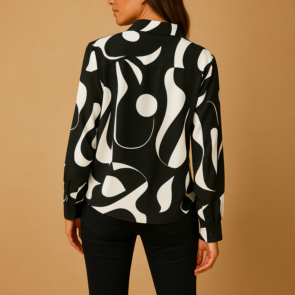 Women’s elegant printed blouse with a smooth fit and refined design, ideal for casual or formal everyday outfits.