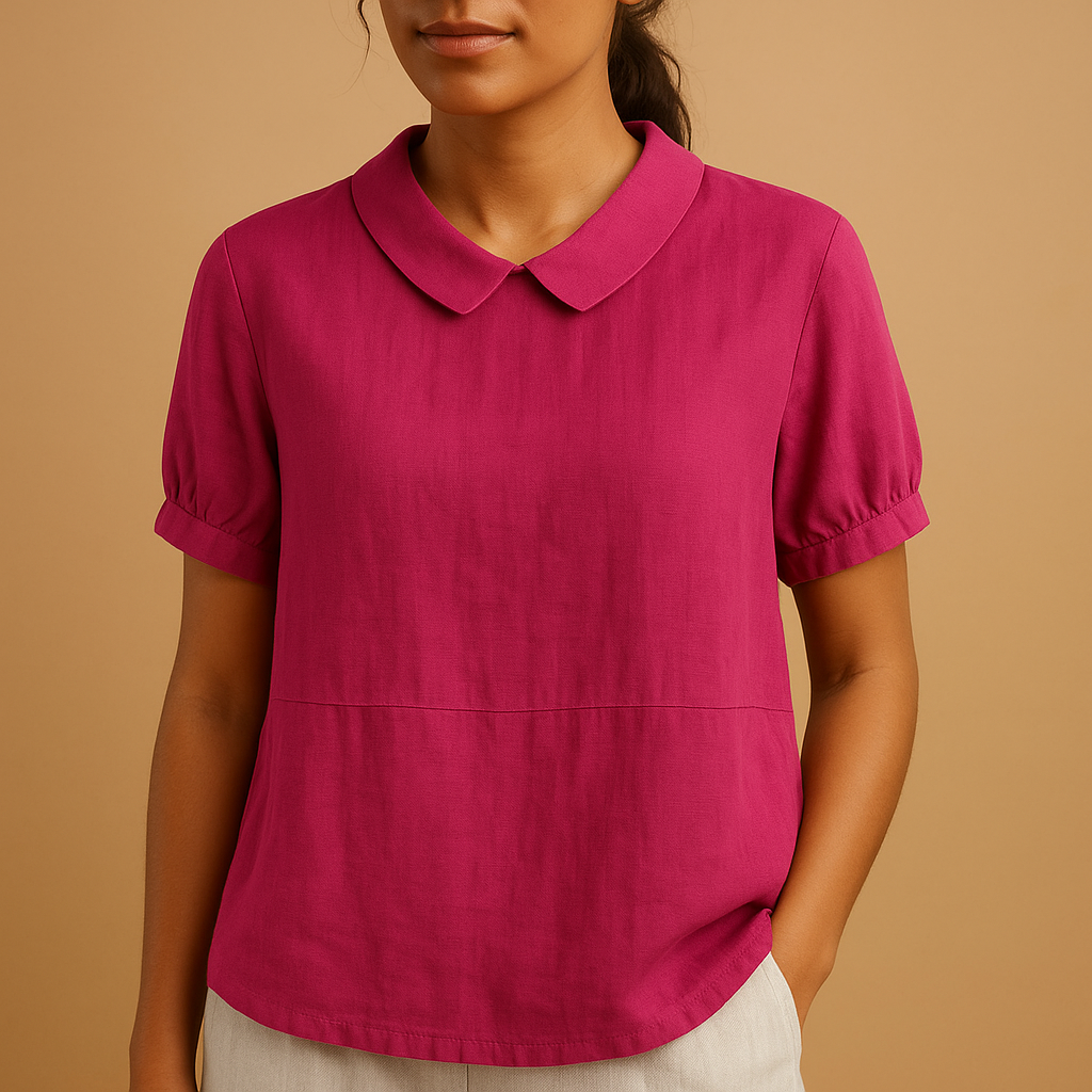 Women’s elegant tailored blouse with a classic design, ideal for office outfits, formal occasions, and smart-casual styling.
