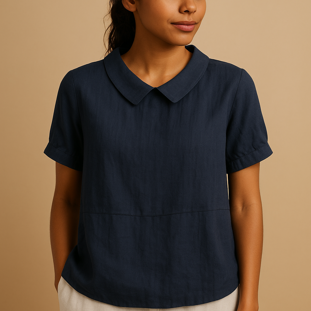 Women’s elegant tailored blouse with a classic design, ideal for office outfits, formal occasions, and smart-casual styling.