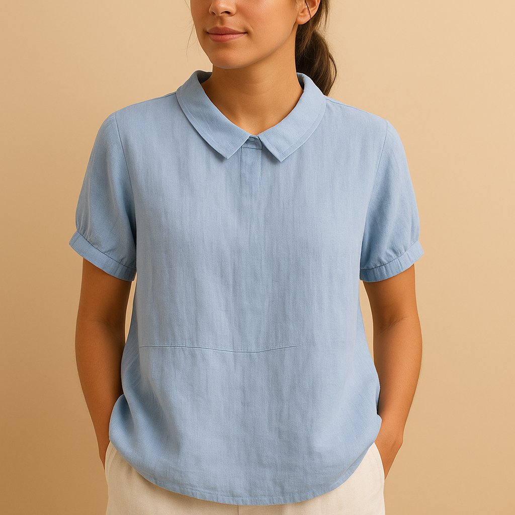 Women’s elegant tailored blouse with a classic design, ideal for office outfits, formal occasions, and smart-casual styling.