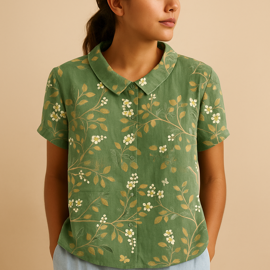 Women’s floral blouse with relaxed fit and breathable fabric, featuring a multicolor flower print for casual and warm-weather outfits.
