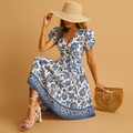 Women’s floral V-neck summer dress with short sleeves and flattering fit, perfect for beach walks, vacations, and stylish summer outings.