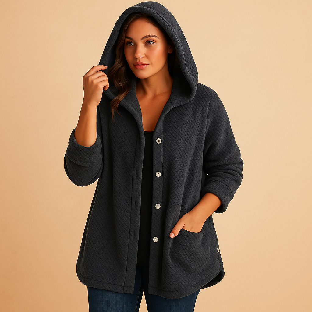 Women’s insulated winter coat with hood and zipper closure, water-repellent fabric and flattering silhouette for cold-weather outings.