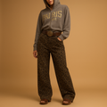 Women’s leopard print slim fit jeans with a flattering silhouette and bold animal print design, perfect for casual outfits or stylish evening looks.