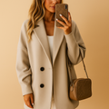 Women’s long elegant single-breasted coat with slim fit and extended length, ideal for work, winter outings, and formal occasions.