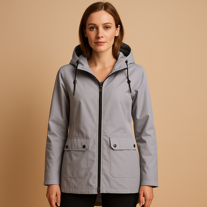 Women’s long waterproof raincoat with hood, breathable fabric, and lightweight design for stylish everyday rain protection.