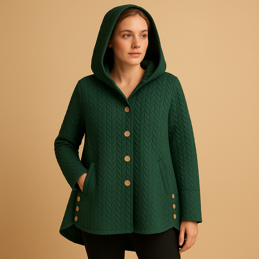 Women’s long winter coat with hood, button closure and extended silhouette, designed for warmth, comfort and everyday winter outfits.