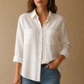 Women’s loose-fit long sleeve blouse with a classic silhouette, available in multiple colors for casual and office outfits.