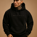 Men’s modern hooded sweatshirt in soft warm fabric, ideal for casual and sporty outfits during autumn and winter.