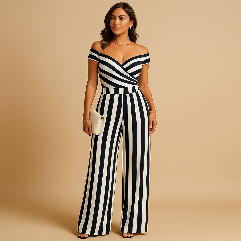 Woman wearing an off-shoulder floral jumpsuit with a tailored silhouette and blue-red print, ideal for weddings, ceremonies, and summer events.