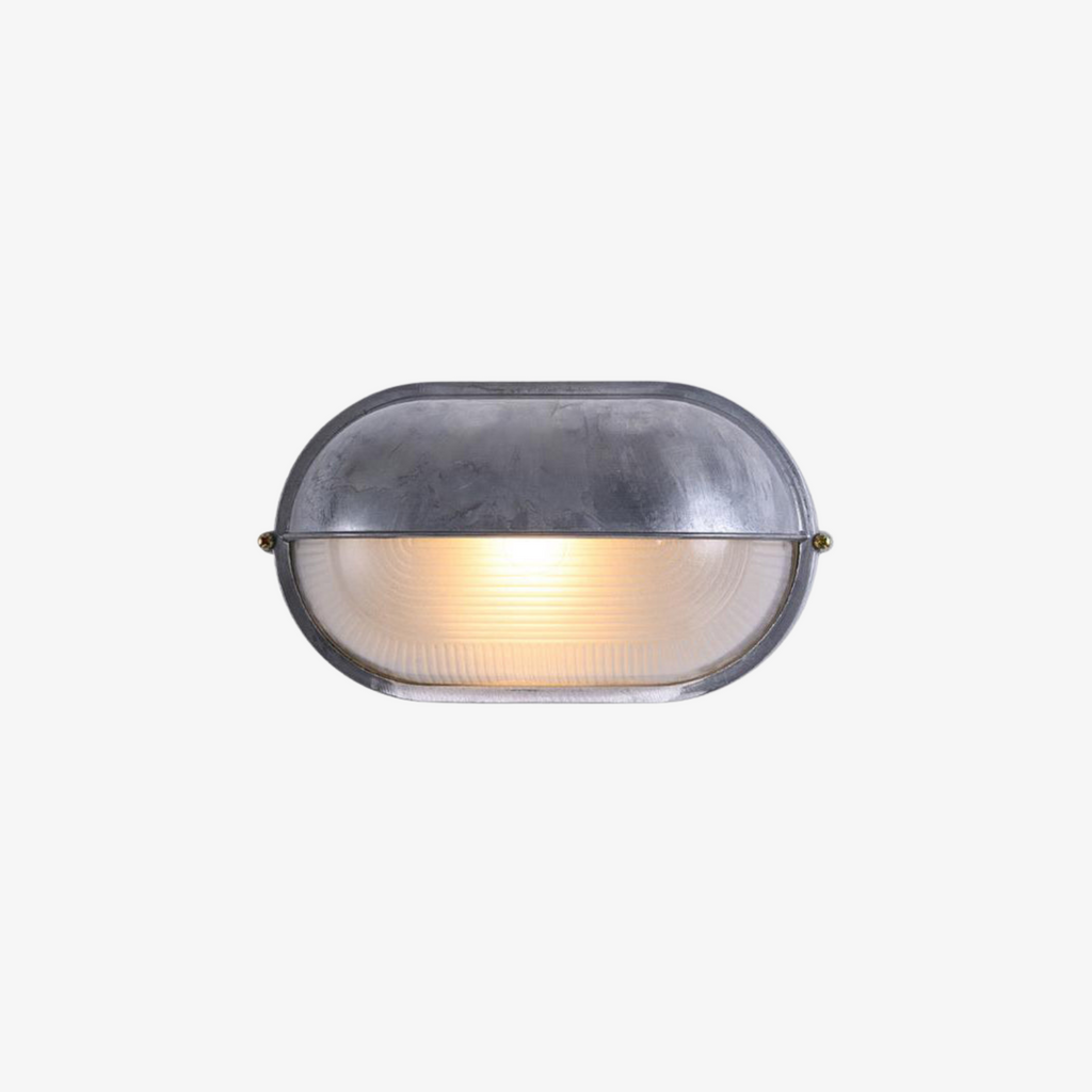 Outdoor Bulkhead Wall Light with Oval Design and Ribbed Glass Diffuser - Image 1