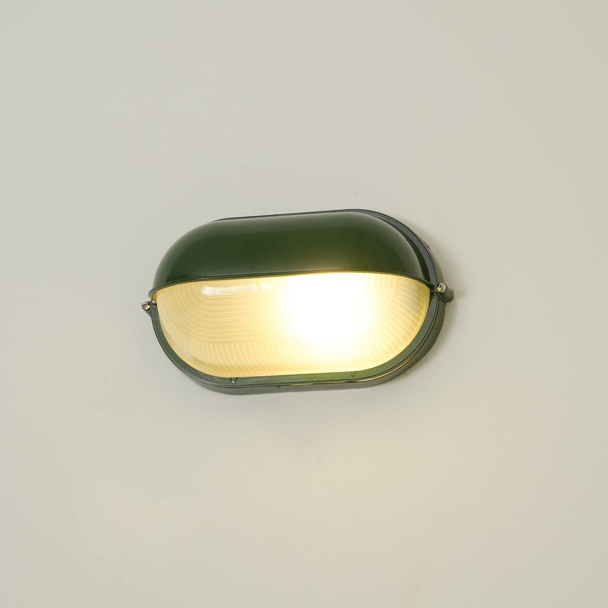 Outdoor Bulkhead Wall Light with Oval Design and Ribbed Glass Diffuser - Image 25