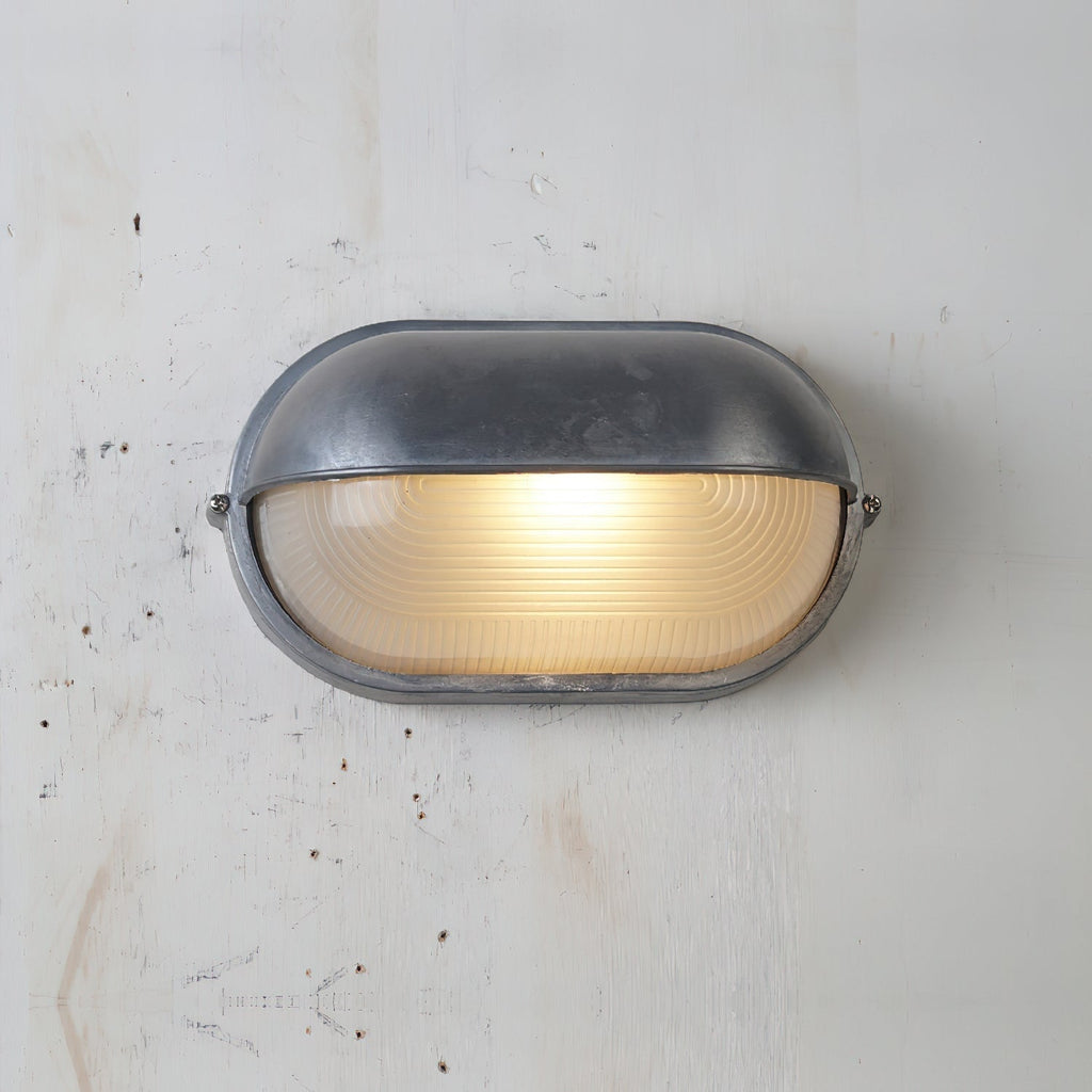 Outdoor Bulkhead Wall Light with Oval Design and Ribbed Glass Diffuser - Image 46