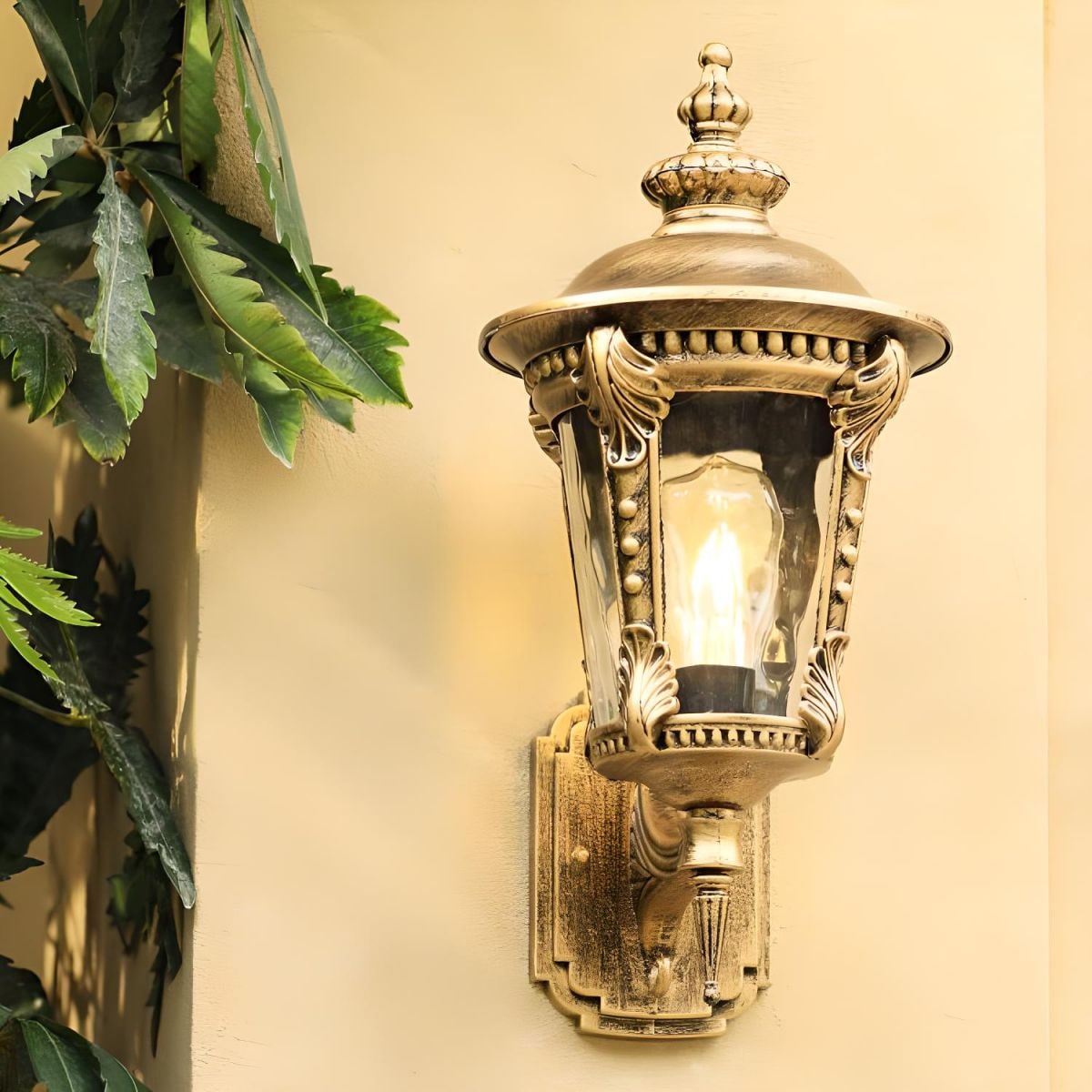 Outdoor Wall Sconce with Antique Brass Finish and Decorative Glass Shade - Image 2