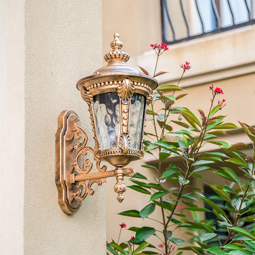 Outdoor Wall Sconce with Antique Brass Finish and Decorative Glass Shade - Image 3