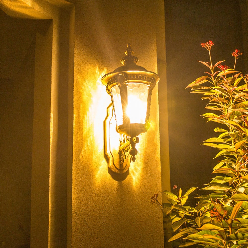 Outdoor Wall Sconce with Antique Brass Finish and Decorative Glass Shade - Image 9