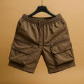 Men’s oversized cargo shorts with multiple pockets, designed for summer comfort, outdoor activities, and casual everyday wear.