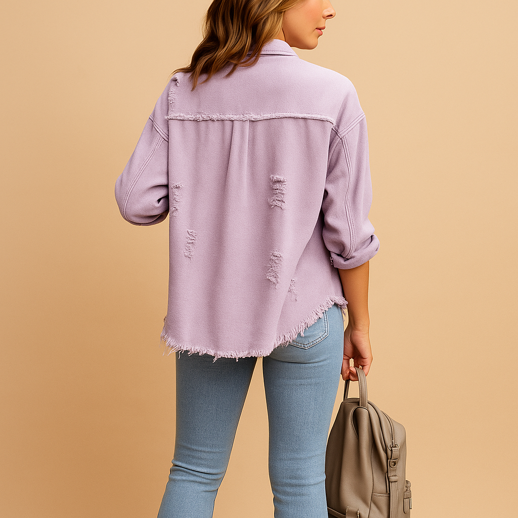 Women’s oversized vintage denim jacket with distressed details and relaxed fit, ideal for casual outfits and trendy layered looks.