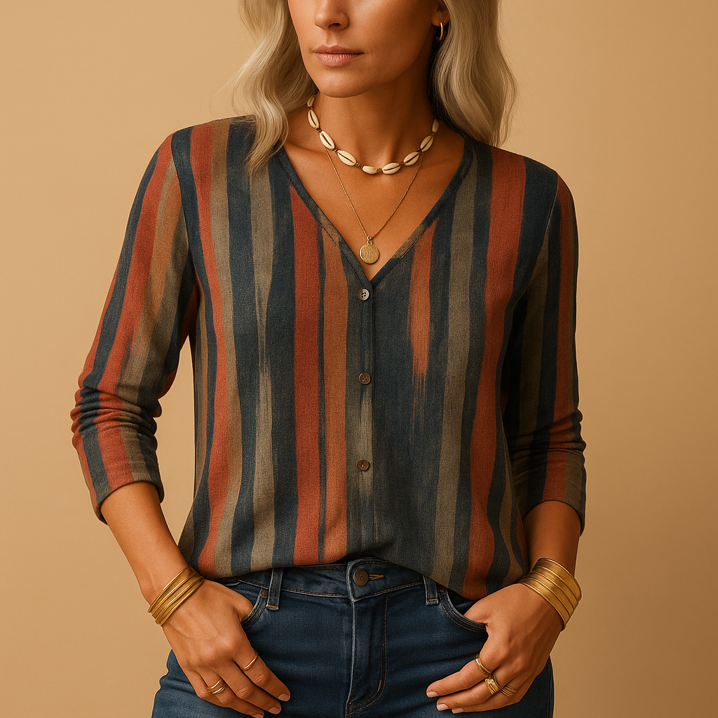 Women’s long-sleeve top with mixed prints, light stretch cotton blend and a flattering fit suitable for casual, office and trendy outfits.