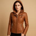 Woman wearing a short jacket for women with a slim fit, zipper details, and removable hood, styled for everyday and outdoor wear.