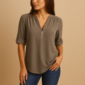 Women’s V-neck blouse with a breathable, lightly tailored fit, ideal for work, casual wear, and stylish everyday outfits.